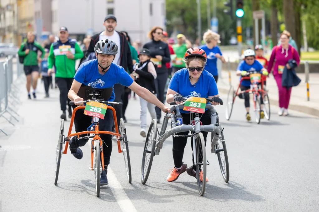 A group of people riding bicycles